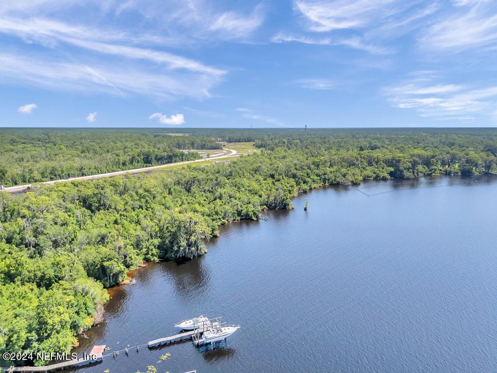 0 State Road 13 St. Augustine, FL 32092 - Photo 22 of 36 a view of a lake with a mountain in the background