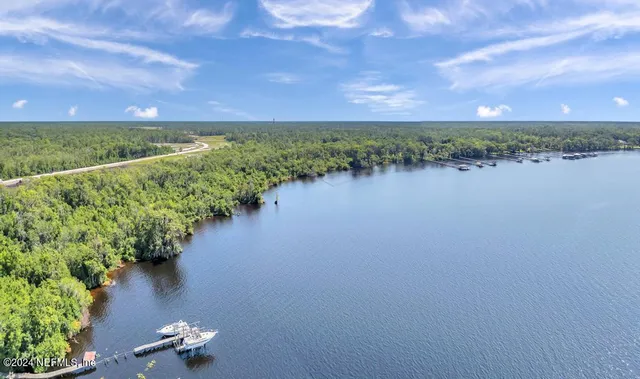 a view of a lake from a yard