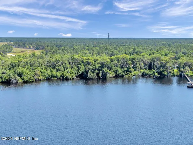 a view of a lake with a city