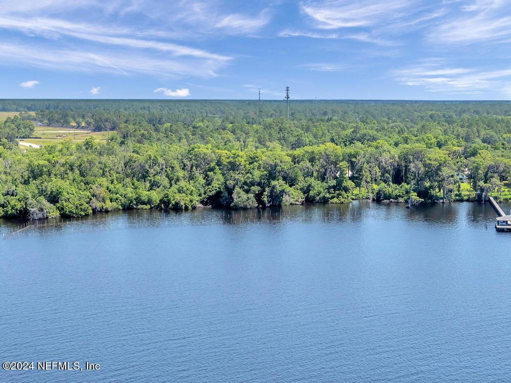 0 State Road 13 St. Augustine, FL 32092 - Photo 26 of 36 a view of a lake with a city