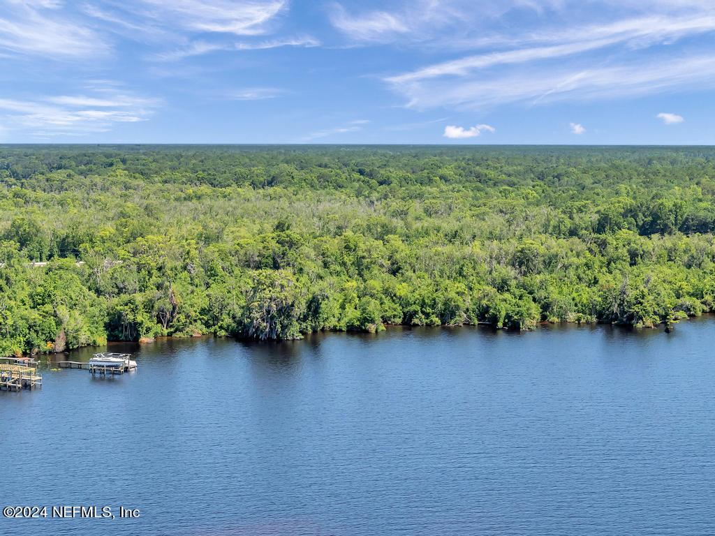 0 State Road 13 St. Augustine, FL 32092 - Photo 30 of 36 a view of a garden with a building in the background