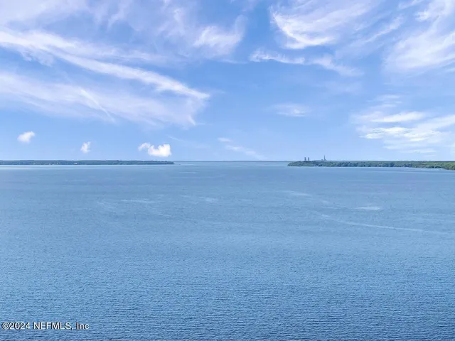 a view of beach and an ocean