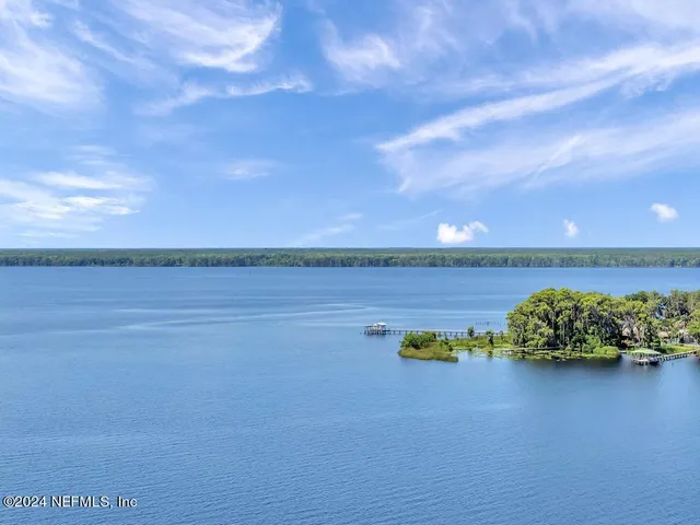 a view of a lake with outdoor space