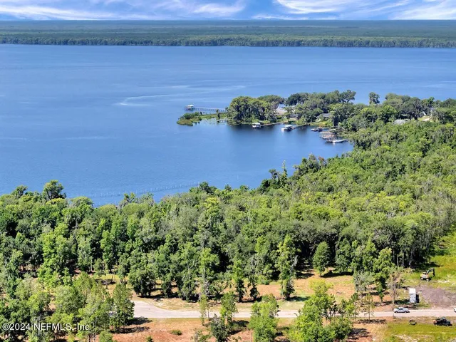 a view of a lake with a outdoor space