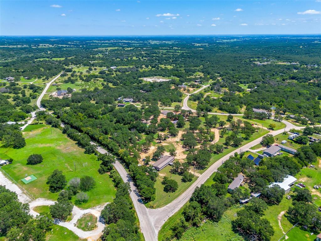 410 Wild Hill Springtown, TX 76082 - Photo 5 of 19 a view of a green field