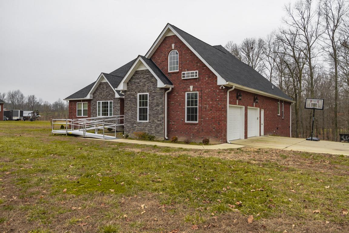 231 Calvert Ridge Road Westmoreland, TN 37186 - Photo 2 of 27 a front view of a house with a yard