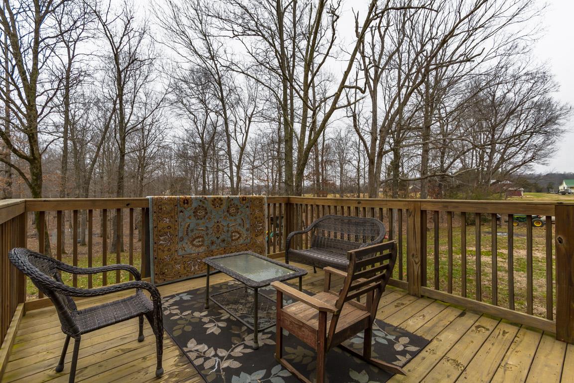 231 Calvert Ridge Road Westmoreland, TN 37186 - Photo 22 of 27 a view of a two chairs on the deck
