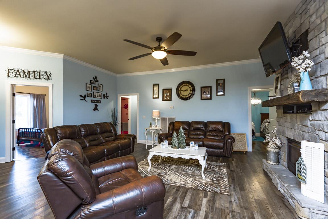 231 Calvert Ridge Road Westmoreland, TN 37186 - Photo 4 of 27 a living room with furniture and a fireplace