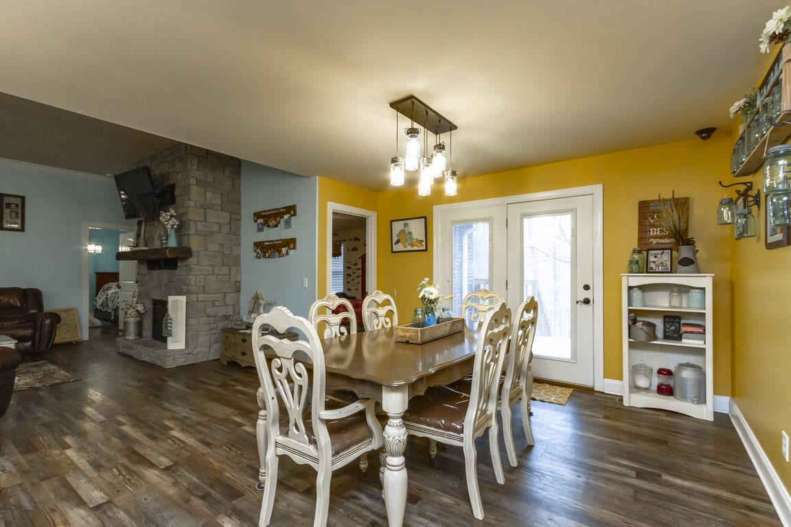 231 Calvert Ridge Road Westmoreland, TN 37186 - Photo 5 of 27 a view of a dining room with furniture and wooden floor