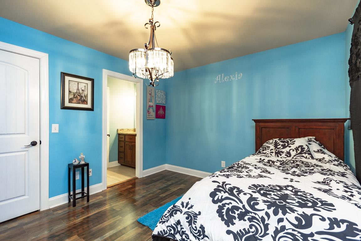 231 Calvert Ridge Road Westmoreland, TN 37186 - Photo 10 of 27 a view of a bedroom with wooden floor