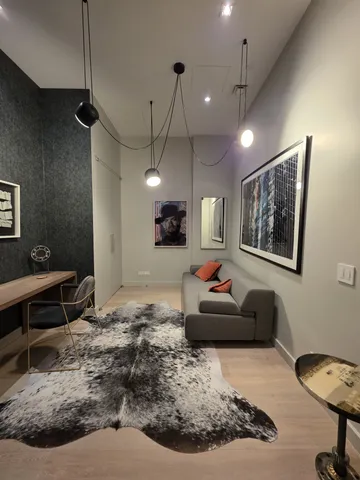 a room with a table and chairs