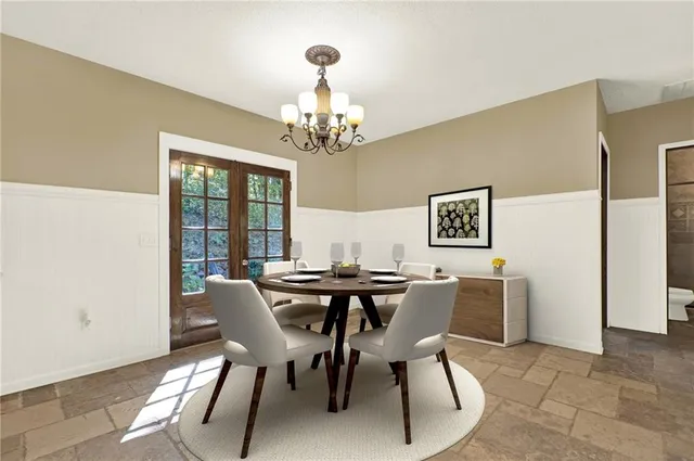 a living room with fireplace furniture and a window