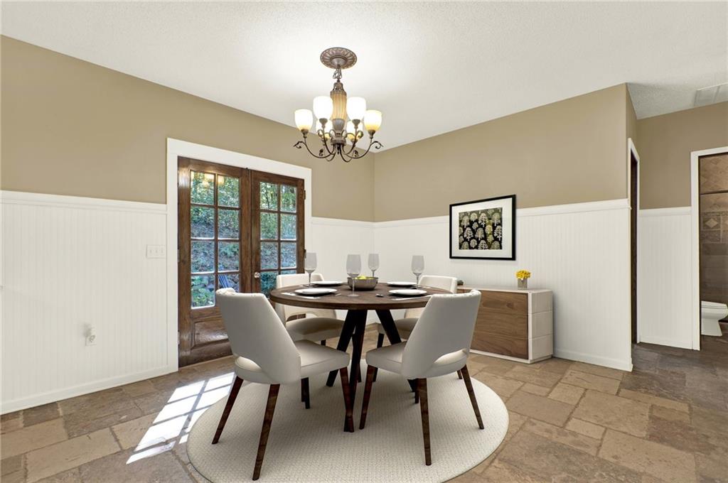 438 East Price Creek Road Jasper, GA 30143 - Photo 15 of 64 a view of a dining room with furniture a chandelier and wooden floor