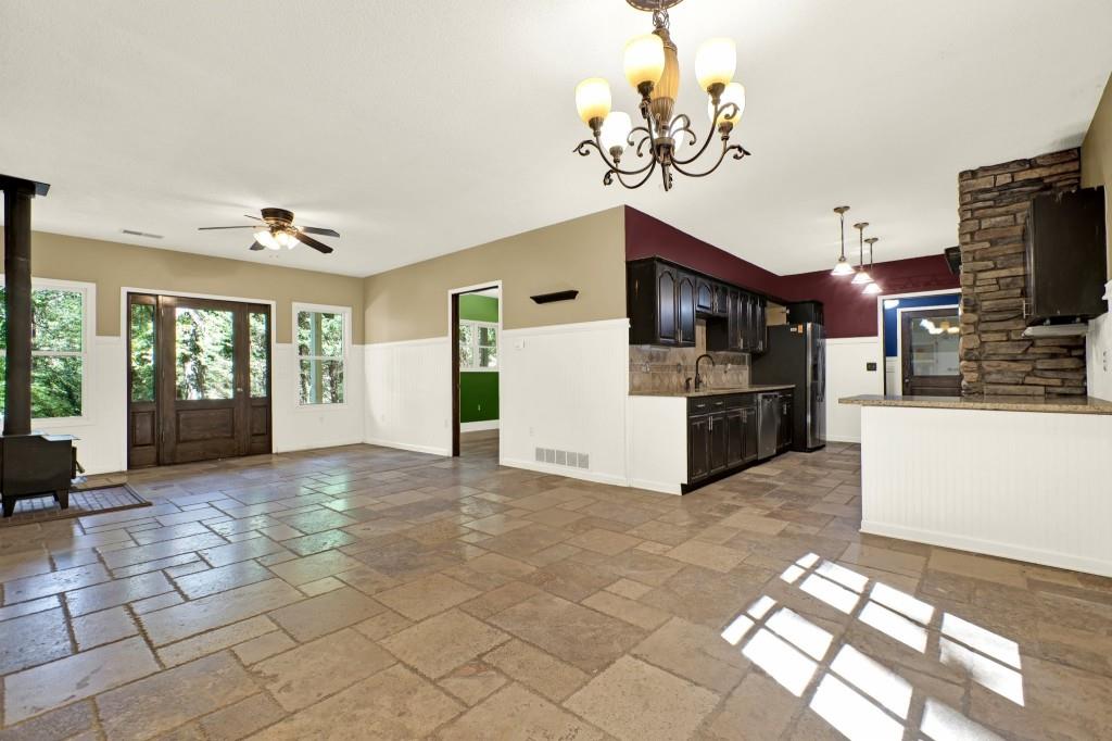 438 East Price Creek Road Jasper, GA 30143 - Photo 19 of 64 a view of a kitchen with a sink and a refrigerator