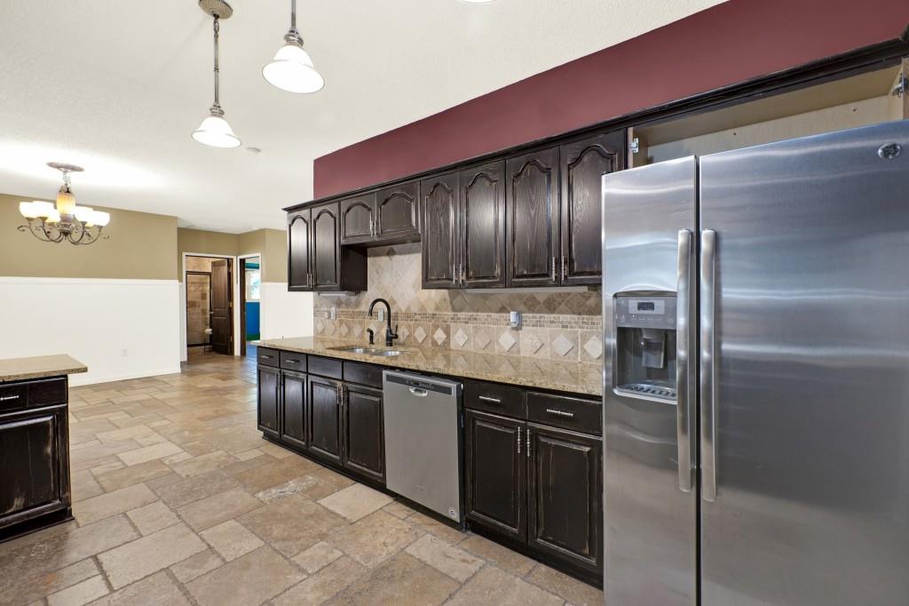 438 East Price Creek Road Jasper, GA 30143 - Photo 22 of 64 a kitchen with stainless steel appliances granite countertop a refrigerator and a sink