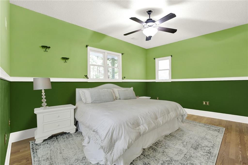 438 East Price Creek Road Jasper, GA 30143 - Photo 31 of 64 a bedroom with a bed and windows