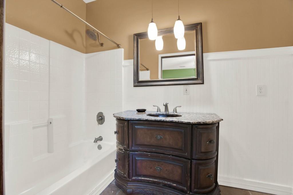 438 East Price Creek Road Jasper, GA 30143 - Photo 35 of 64 a bathroom with a sink a vanity and a bathtub