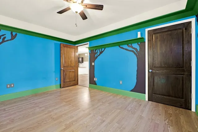 a view of a kitchen with furniture and cabinets