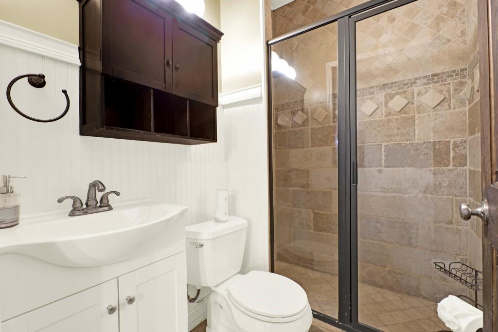 438 East Price Creek Road Jasper, GA 30143 - Photo 42 of 64 a bathroom with a sink a toilet and shower