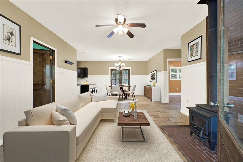 438 East Price Creek Road Jasper, GA 30143 - Photo 5 of 64 a living room with furniture fireplace and a flat screen tv