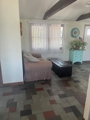 a bedroom with a bed and a cabinets