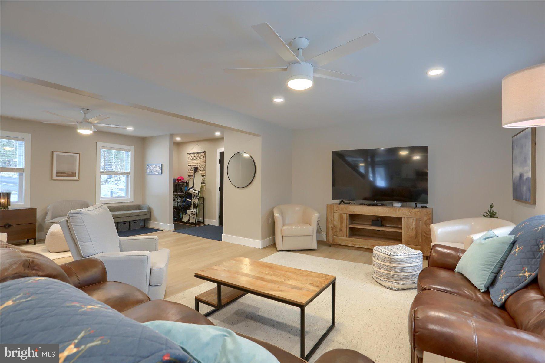 1365 Roundtop Road Lewisberry, PA 17339 - Photo 11 of 40 a living room with furniture and a flat screen tv