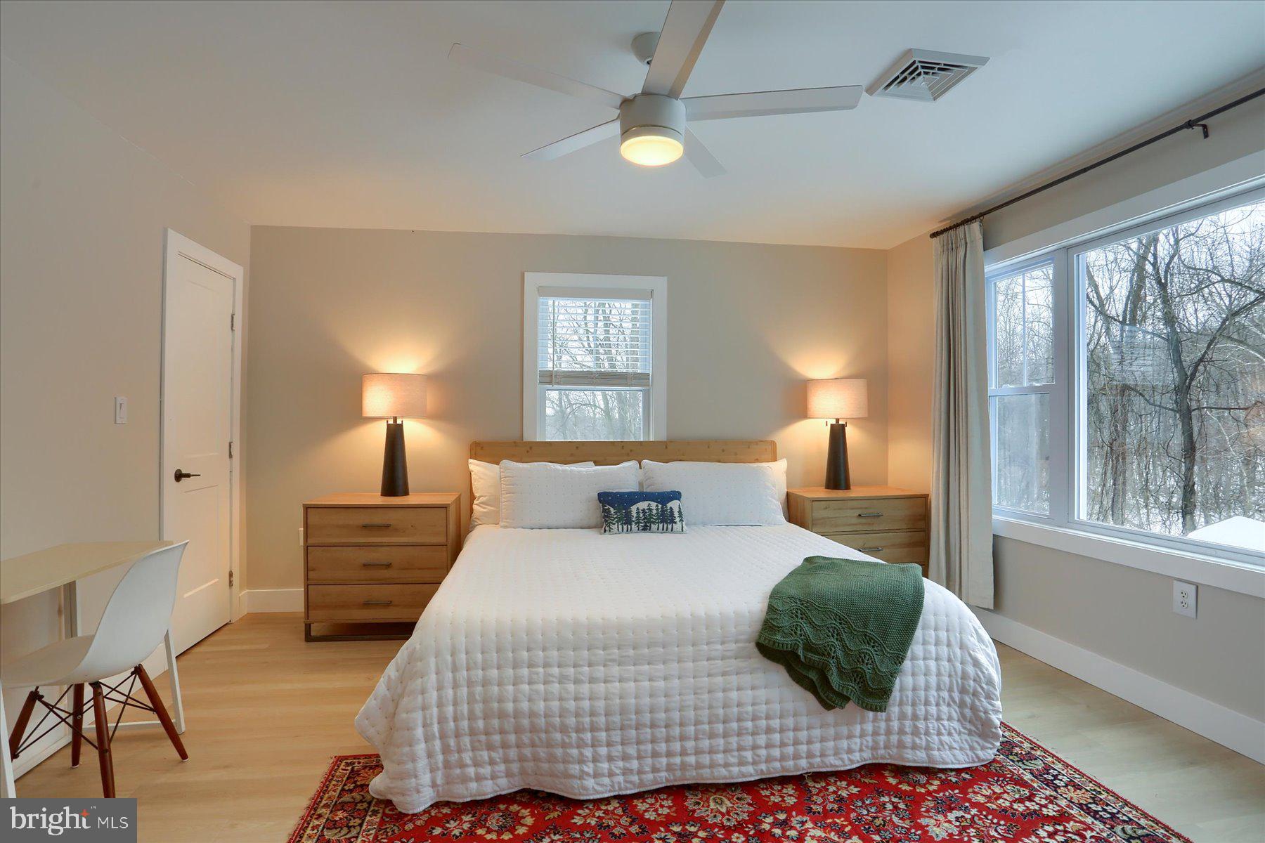 1365 Roundtop Road Lewisberry, PA 17339 - Photo 27 of 40 a bedroom with a large bed and a window