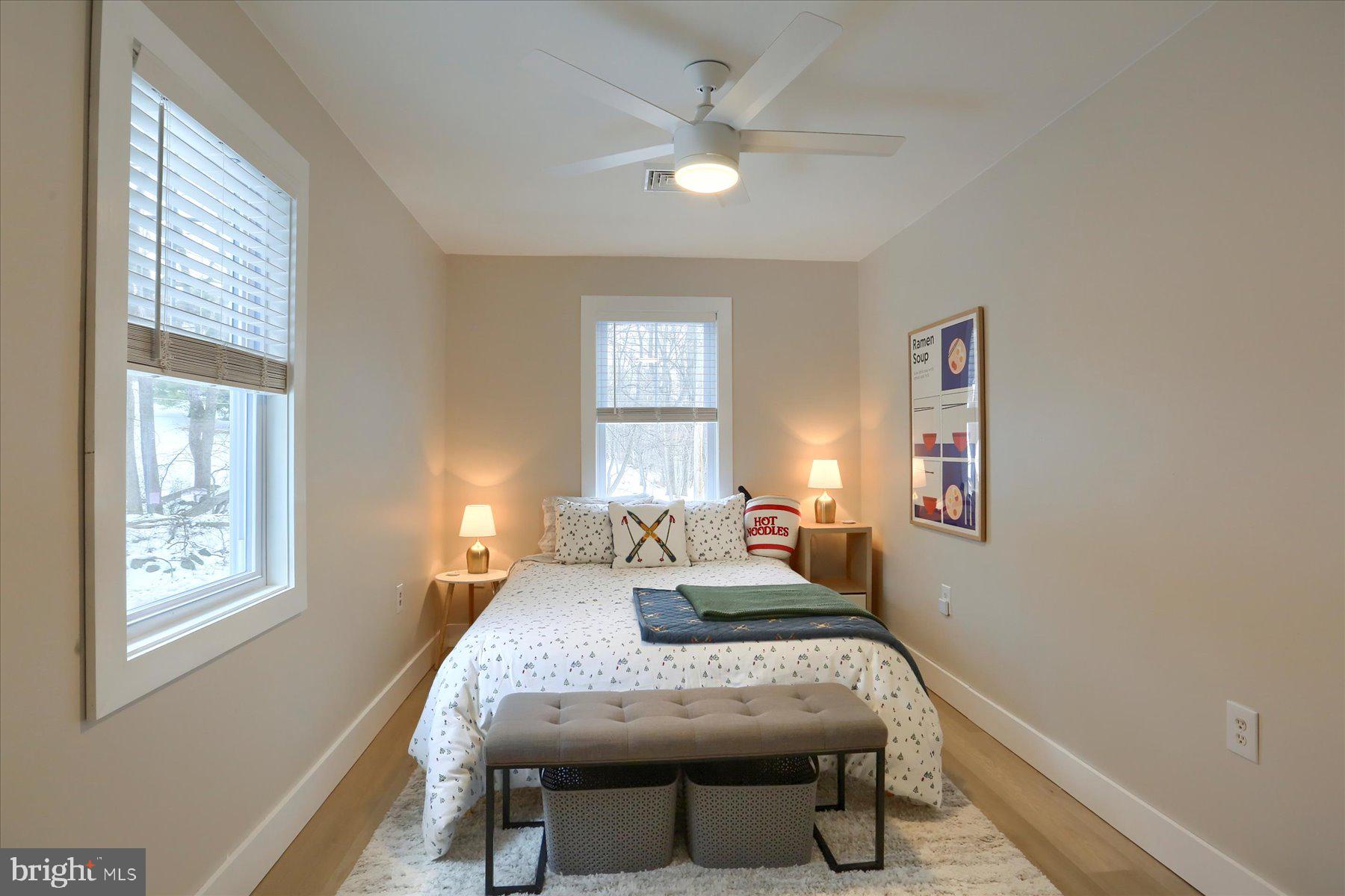 1365 Roundtop Road Lewisberry, PA 17339 - Photo 30 of 40 a bedroom with a bed window and couch