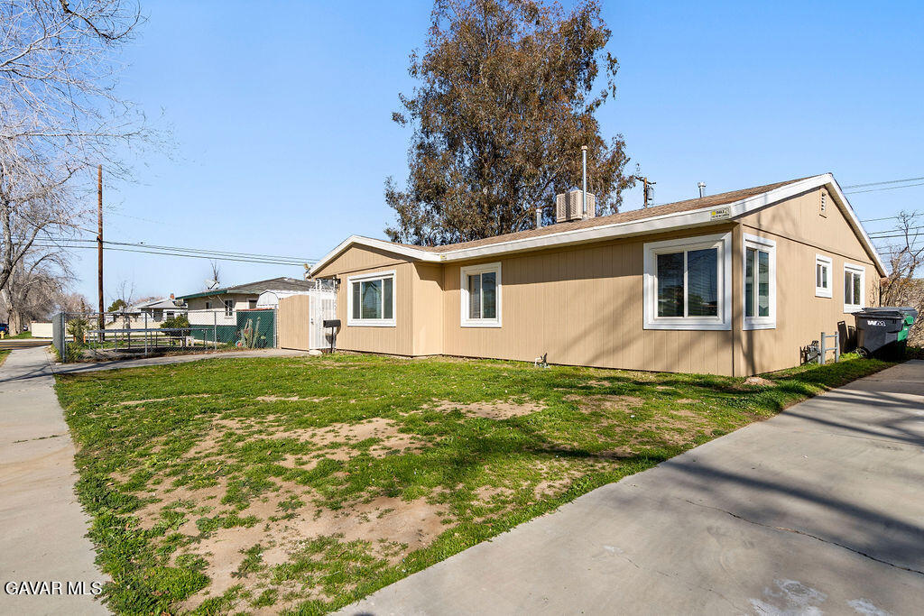 44152 Elm Avenue Lancaster, CA 93534 - Photo 13 of 17 a view of a backyard of the house