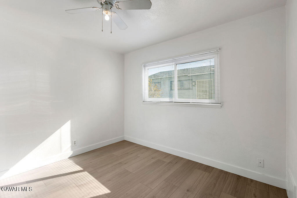 44152 Elm Avenue Lancaster, CA 93534 - Photo 16 of 17 an empty room with a window