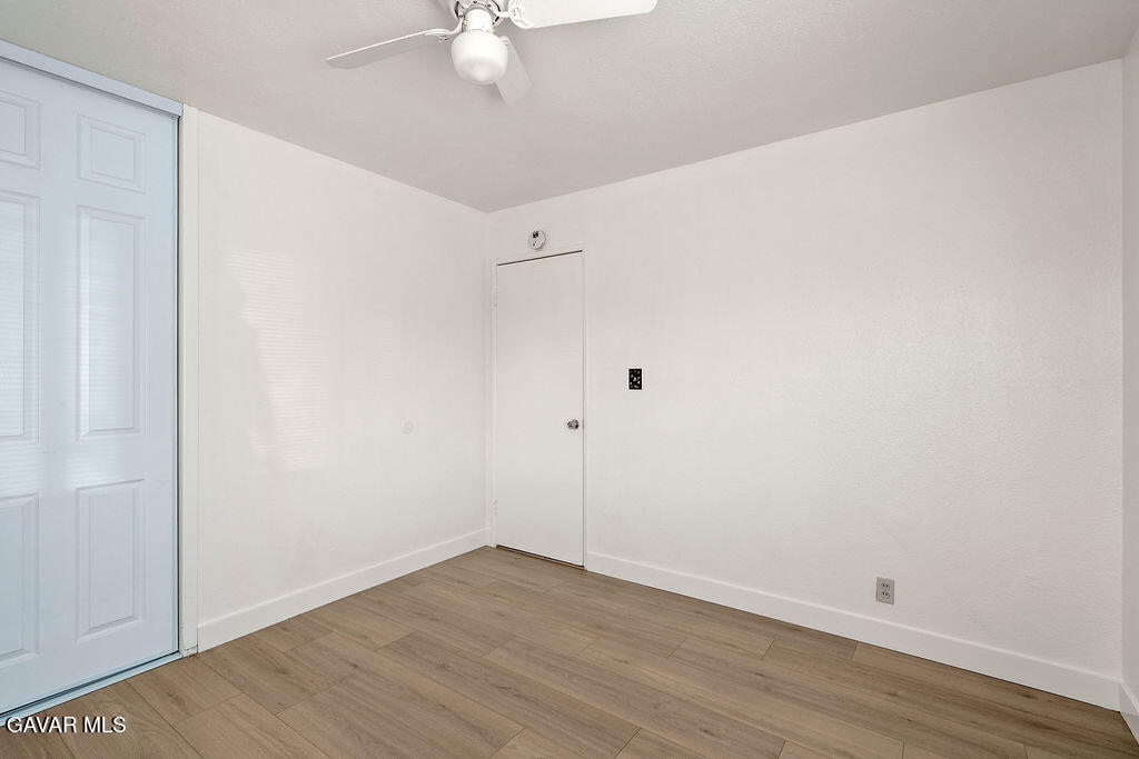 44152 Elm Avenue Lancaster, CA 93534 - Photo 6 of 17 wooden floor in an empty room