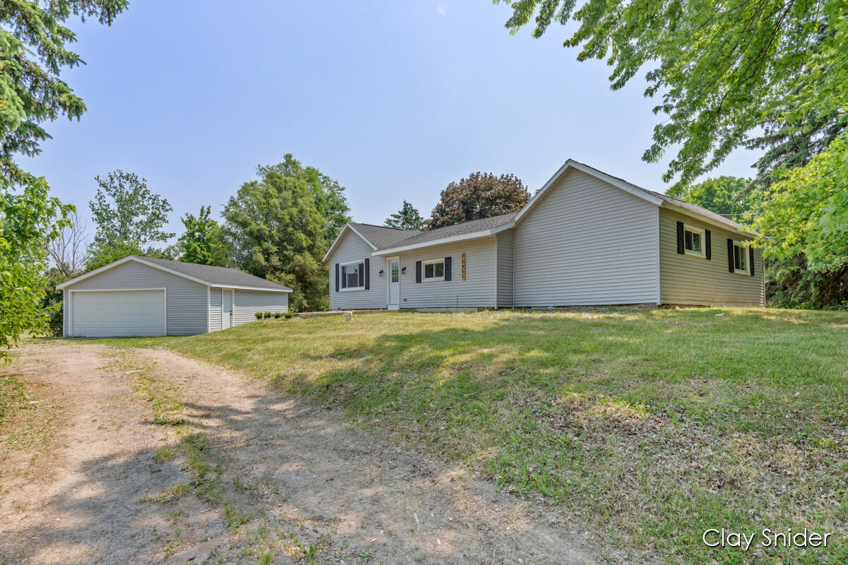 10451 Tasker Road Lake Odessa, MI 48849 - Photo 1 of 44 IMG_1002