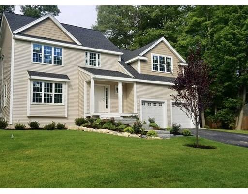 29 Brookdale Road Natick, MA 01760 - Photo 1 of 30 a front view of a house with a yard