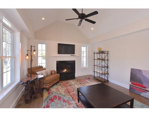 29 Brookdale Road Natick, MA 01760 - Photo 12 of 30 a living room with furniture and a fireplace