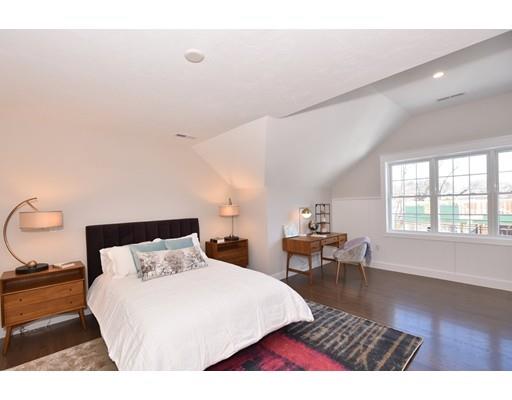 29 Brookdale Road Natick, MA 01760 - Photo 21 of 30 a bedroom with a bed a table and chair