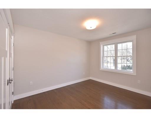29 Brookdale Road Natick, MA 01760 - Photo 28 of 30 a view of an empty room with wooden floor and a window