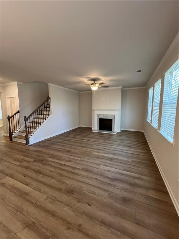 4501 Ajo Walk Atlanta, GA 30331 - Photo 6 of 16 a view of empty room with wooden floor and fireplace