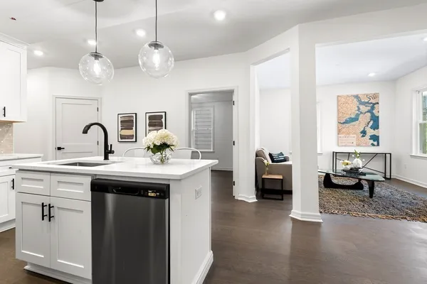 a view of living room with granite countertop furniture and a large window