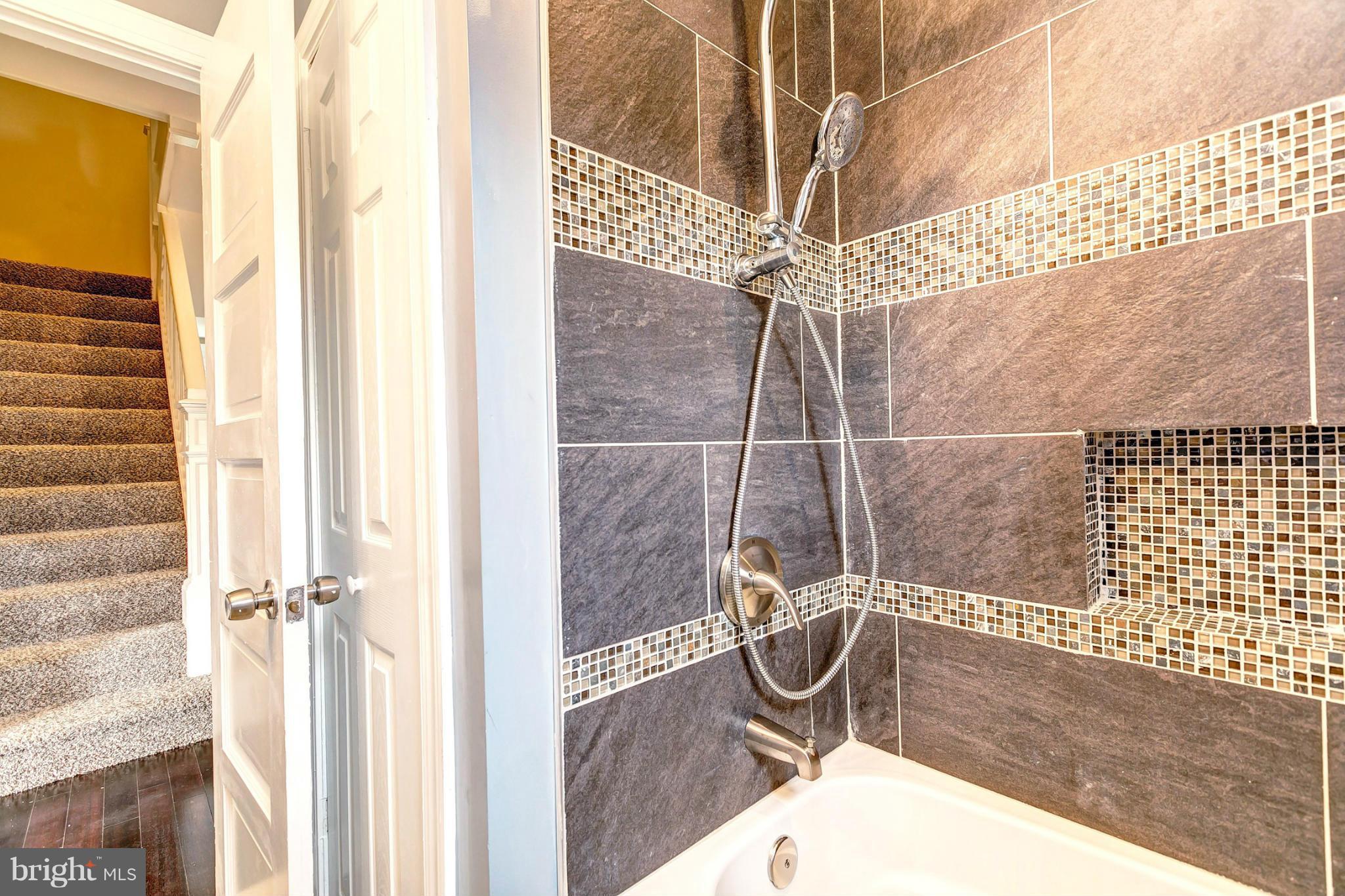 3605 Copley Road Baltimore, MD 21215 - Photo 23 of 30 Spa-Inspired Shower With Intricate Tile Work
