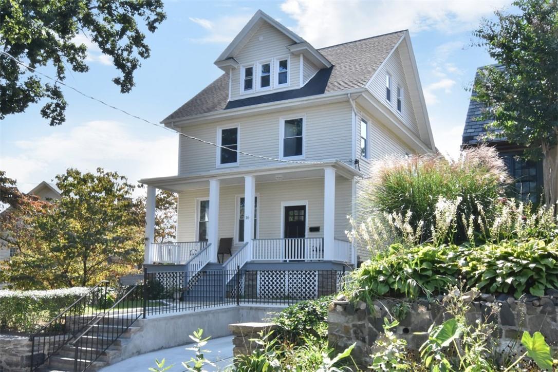 16 Florida Avenue Bronxville, NY 10708 - Photo 1 of 1 a view of a white house next to a yard with potted plants