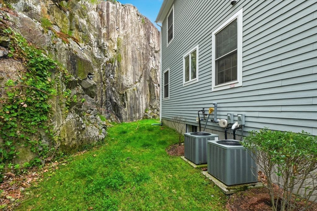 2 B Gates Lane, Unit B Wakefield, MA 01880 - Photo 28 of 42 a view of a house with backyard and sitting area