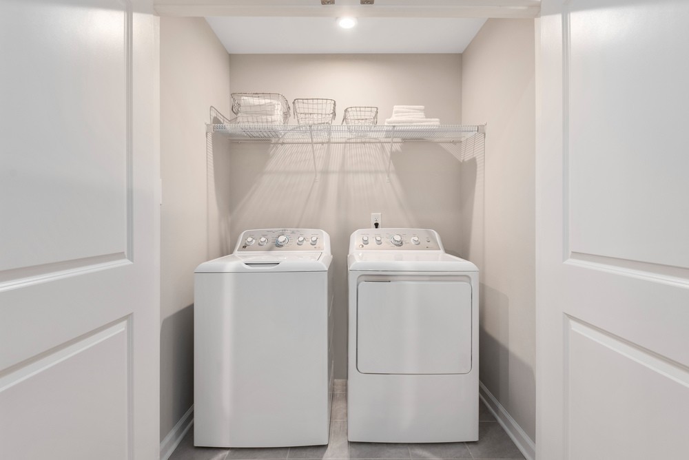 154 Keelon Gap Road Spring Hill, TN 37174 - Photo 13 of 13 a utility room with dryer and washer