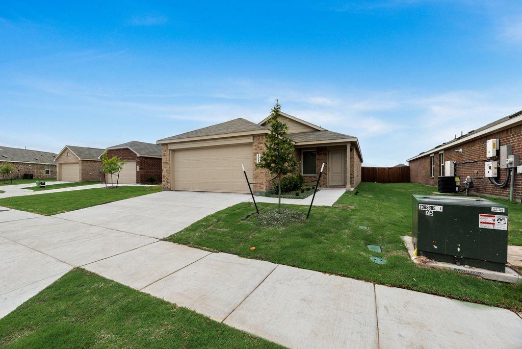 1272 Balsam Road Wilmer, TX 75172 - Photo 13 of 31 a front view of house with yard and green space