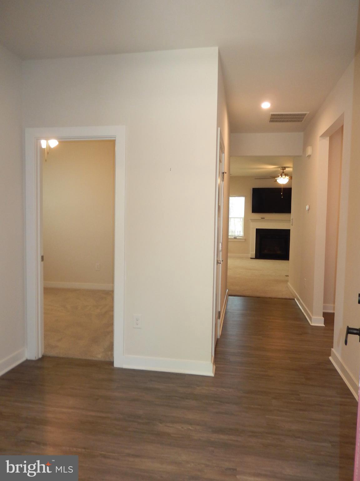 36884 Red Cedar Loop Ocean View, DE 19970 - Photo 5 of 50 a view of hallway with wooden floor