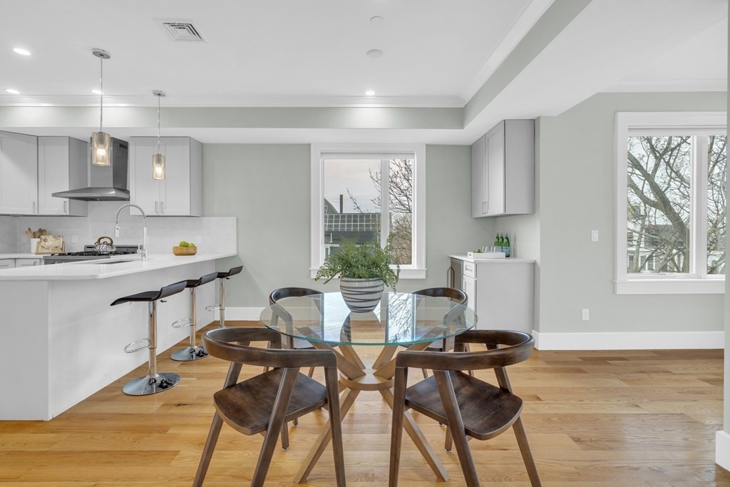 17 Vinton Street, Unit PH Boston, MA 02127 - Photo 16 of 36 a view of a dining room with furniture window and outside view