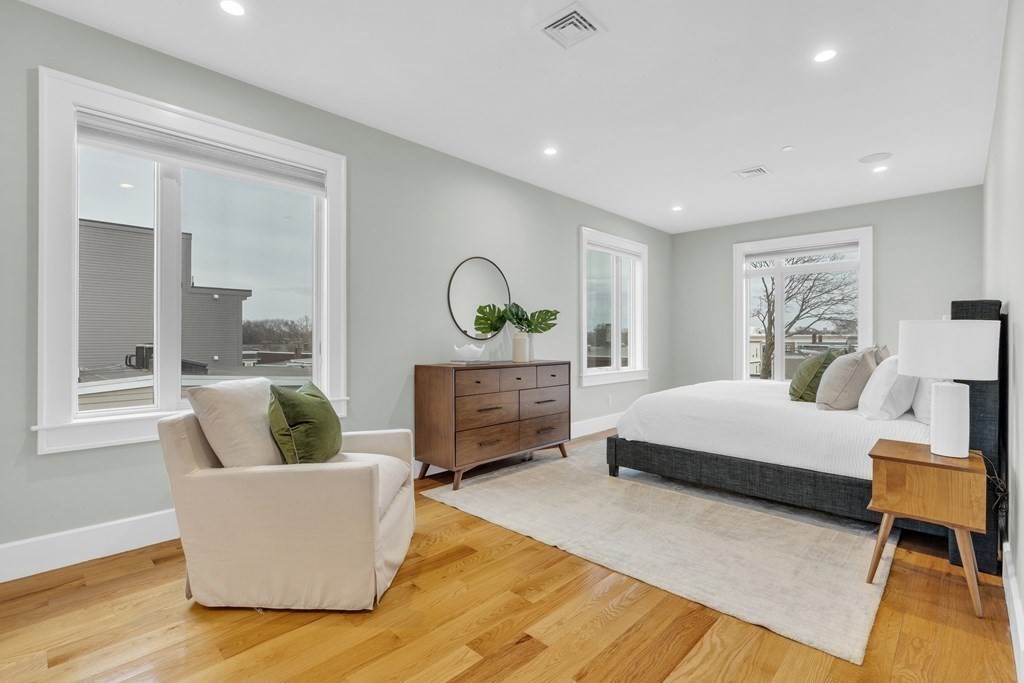 17 Vinton Street, Unit PH Boston, MA 02127 - Photo 21 of 36 a living room with furniture and a couch