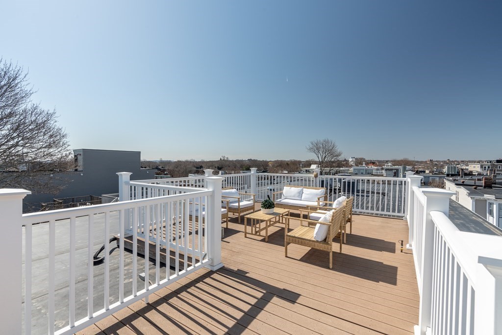 17 Vinton Street, Unit PH Boston, MA 02127 - Photo 33 of 36 a view of a roof deck with furniture