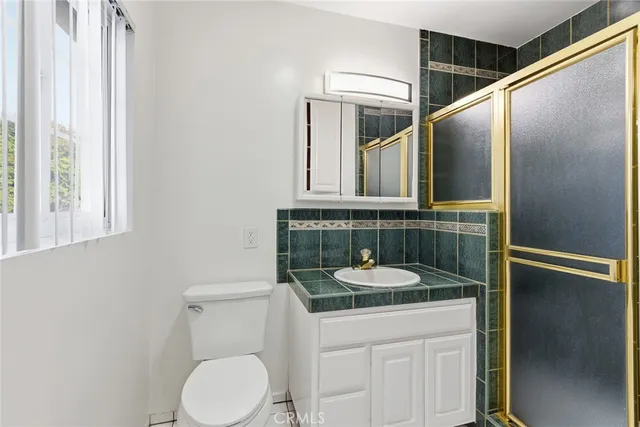 a bathroom with a sink and a toilet