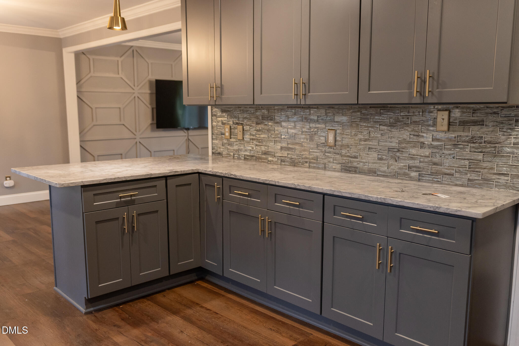6708 Spencer Court Raleigh, NC 27615 - Photo 18 of 35 a kitchen with a sink and cabinets
