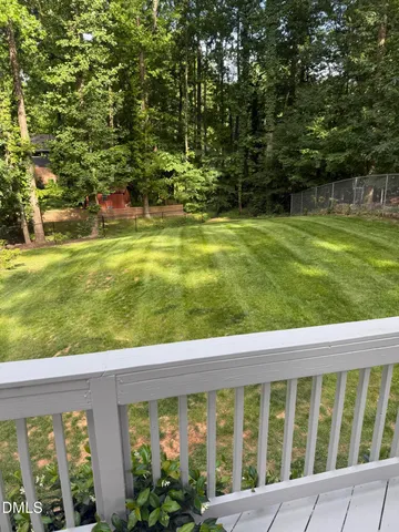 a view of a swimming pool with a garden
